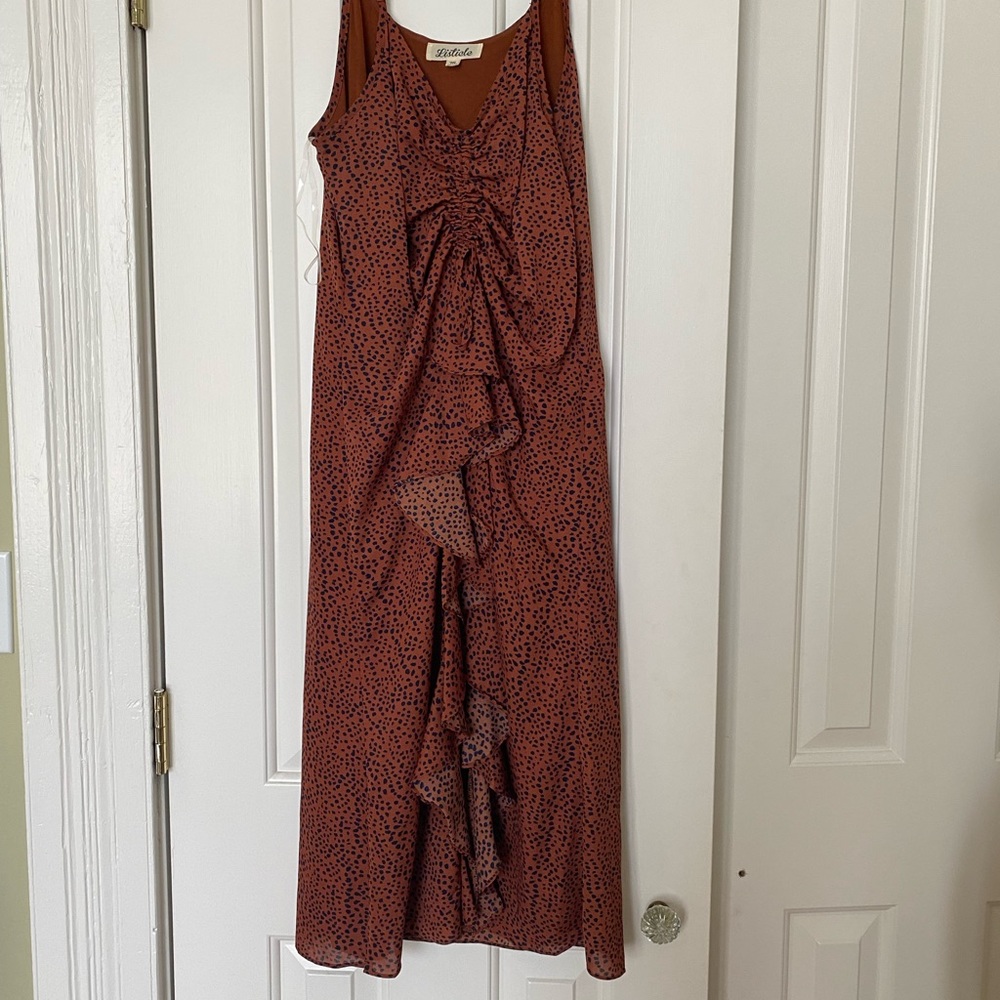 Very pretty, unique style dress.  Worn once to the Kentucky Oaks